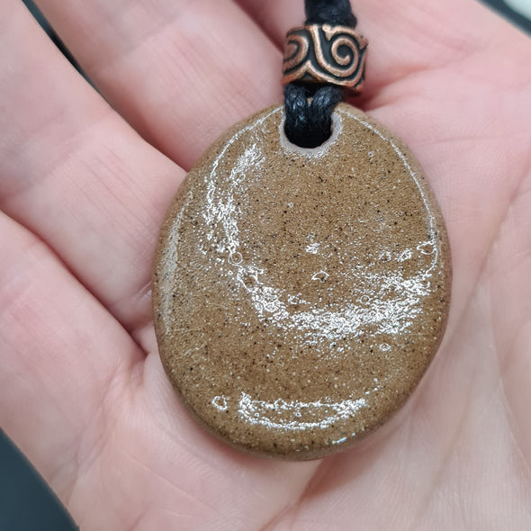 Back view of ammonite pendant