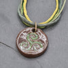 Ceramic triskele pendant with silk cord necklace