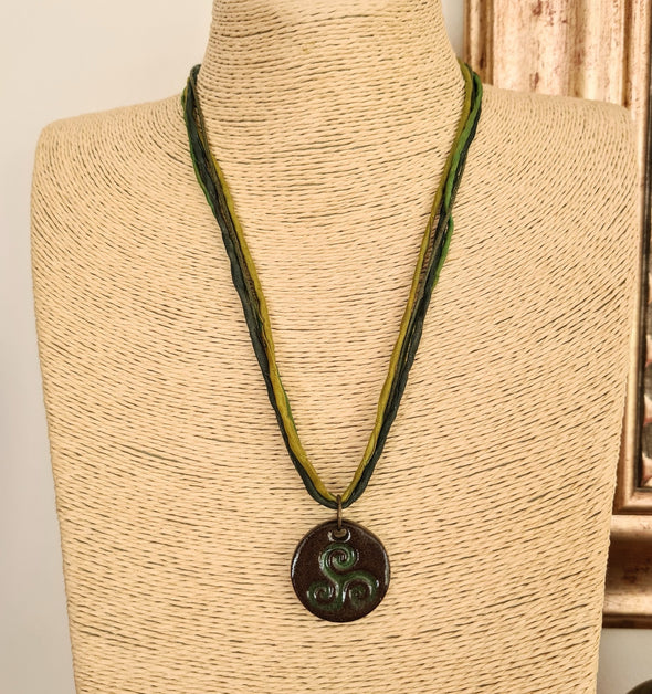 Moonsilver ceramic triskele pendant necklace