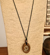 Longline ceramic fossil pendant necklace