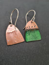 Front and back of enamelled green forest at dusk earrings