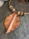 Back view of enamelled leaf pendant