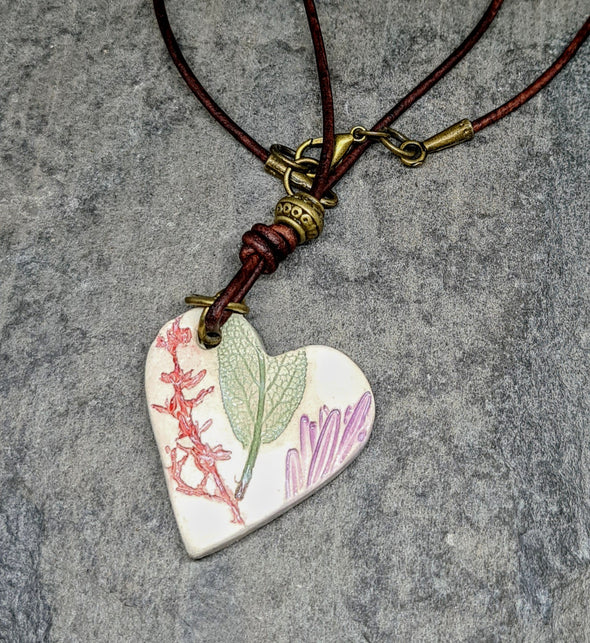 Leaf imprint heart necklace