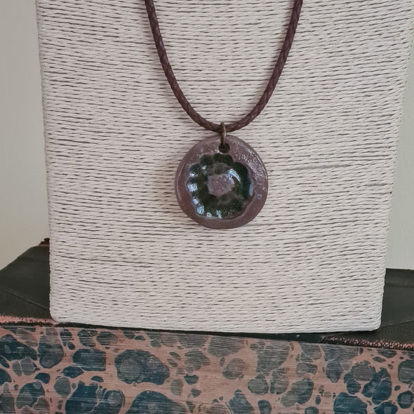 Stoneware and glass pendant