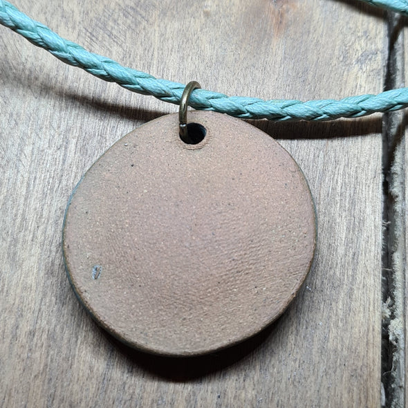 Rear view of ceramic pendant