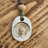Close up of labyrinth pendant