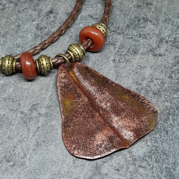 Enamelled copper pear with red agate