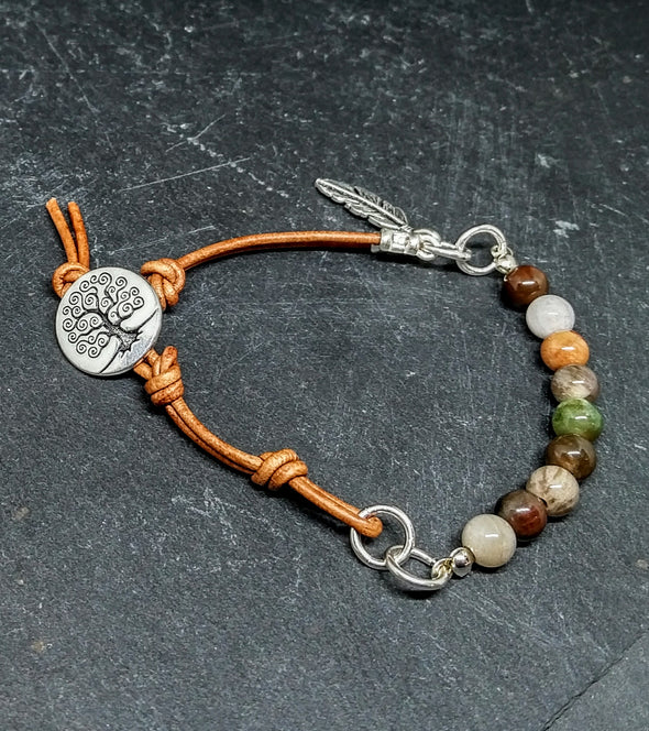 petrified wood leather bracelet with feather charm